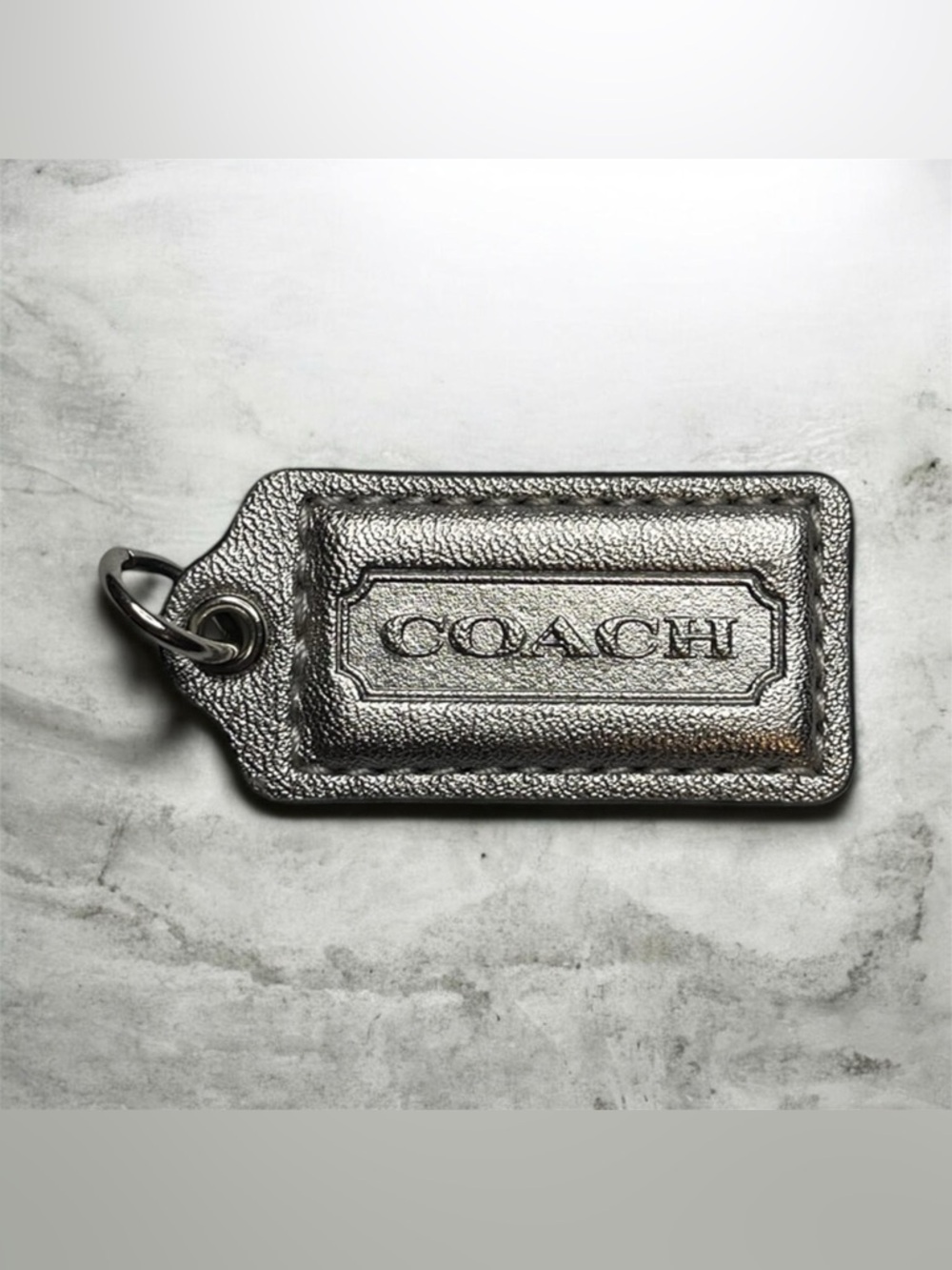 Coach Metallic Silver Leather Key Tag with Embossed Logo